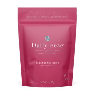 Pink package of Daily-eeze Elderberry Bliss dietary supplement on a white background